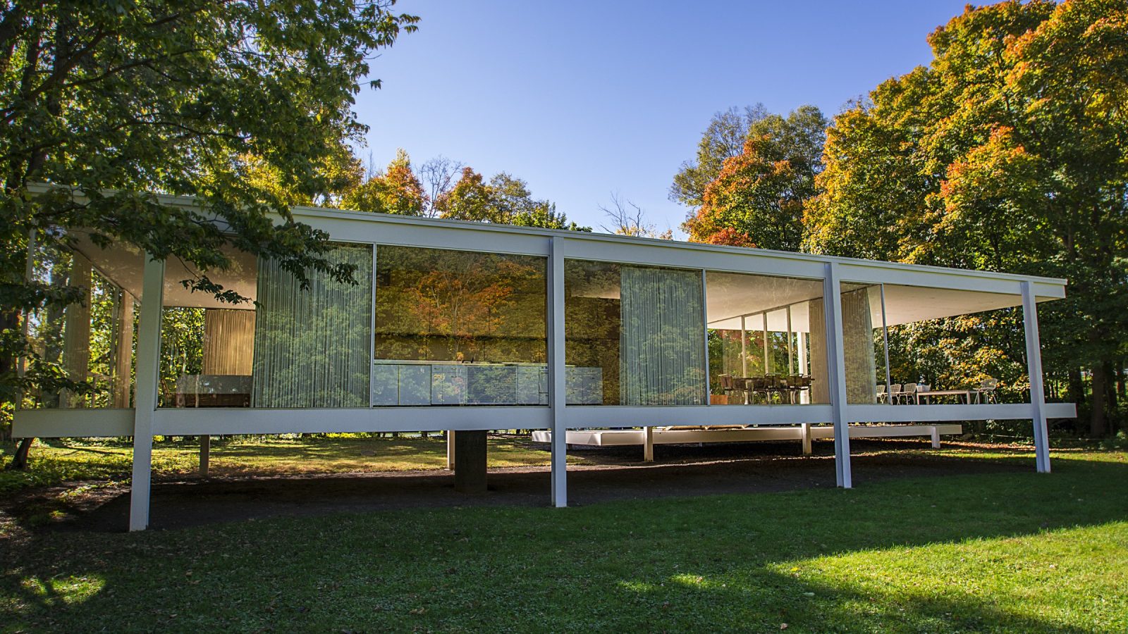 A south-facing glass facade at golden hour, representing Aspect's architectural inventory