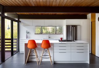 Renovated kitchen with walnut cabinetry