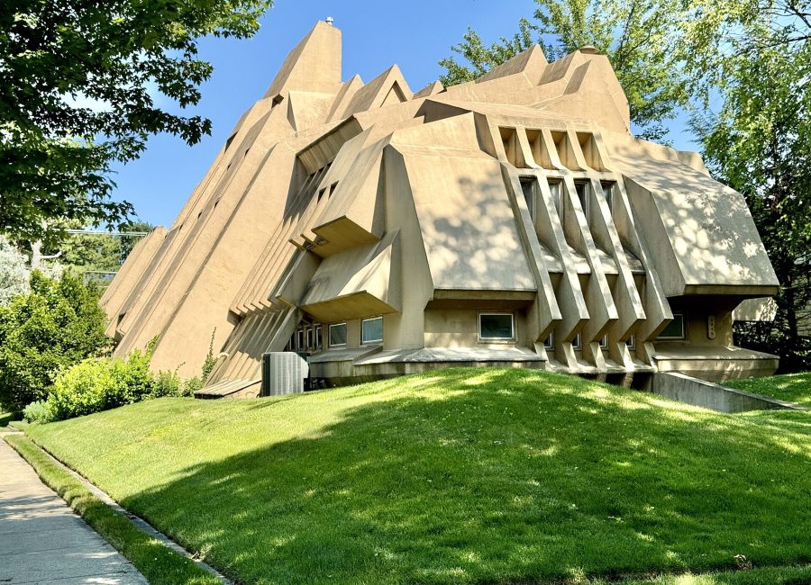 Board-formed concrete volumes at the street facade